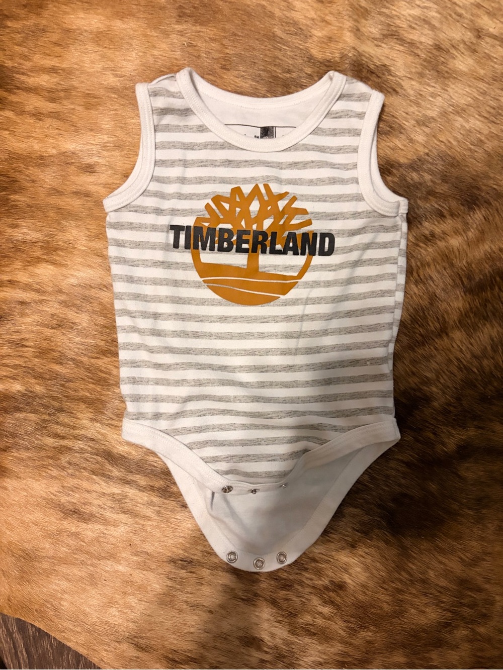 Timberland White & Gray Striped Baby Onesie with Mustard Logo